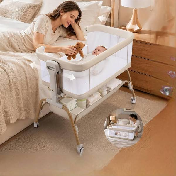 Bedside bassinet set up next to a bed